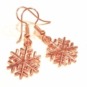 Ohrringe mit Schneeflocken in rosegoldfarben