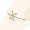 Strass Schneeflocken Armband in hellsilber- oder rosegoldfarben