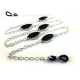 Silberfarbene Brillenkette mit schwarzen ovalen Kristallglasperlen